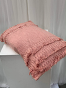 Coussin rose à franges