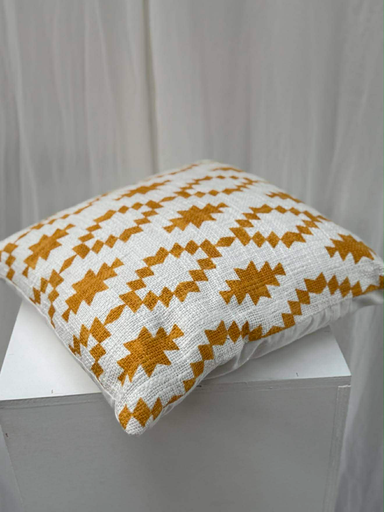 Coussin blanc motif moutarde