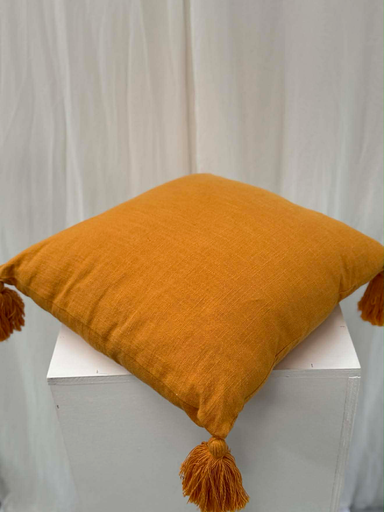 Coussin jaune moutarde à pompons 